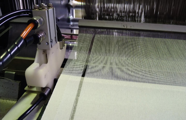 Selvedge Tuck-in Device Available